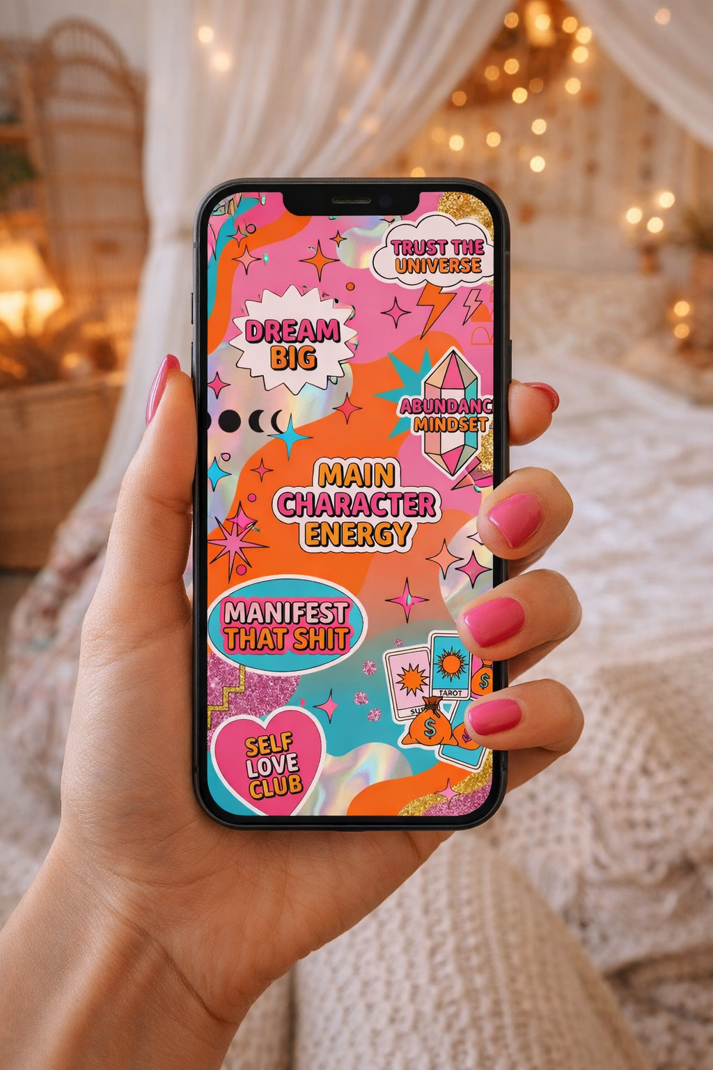 Phone displaying a colorful app interface held by a hand with pink nail polish.